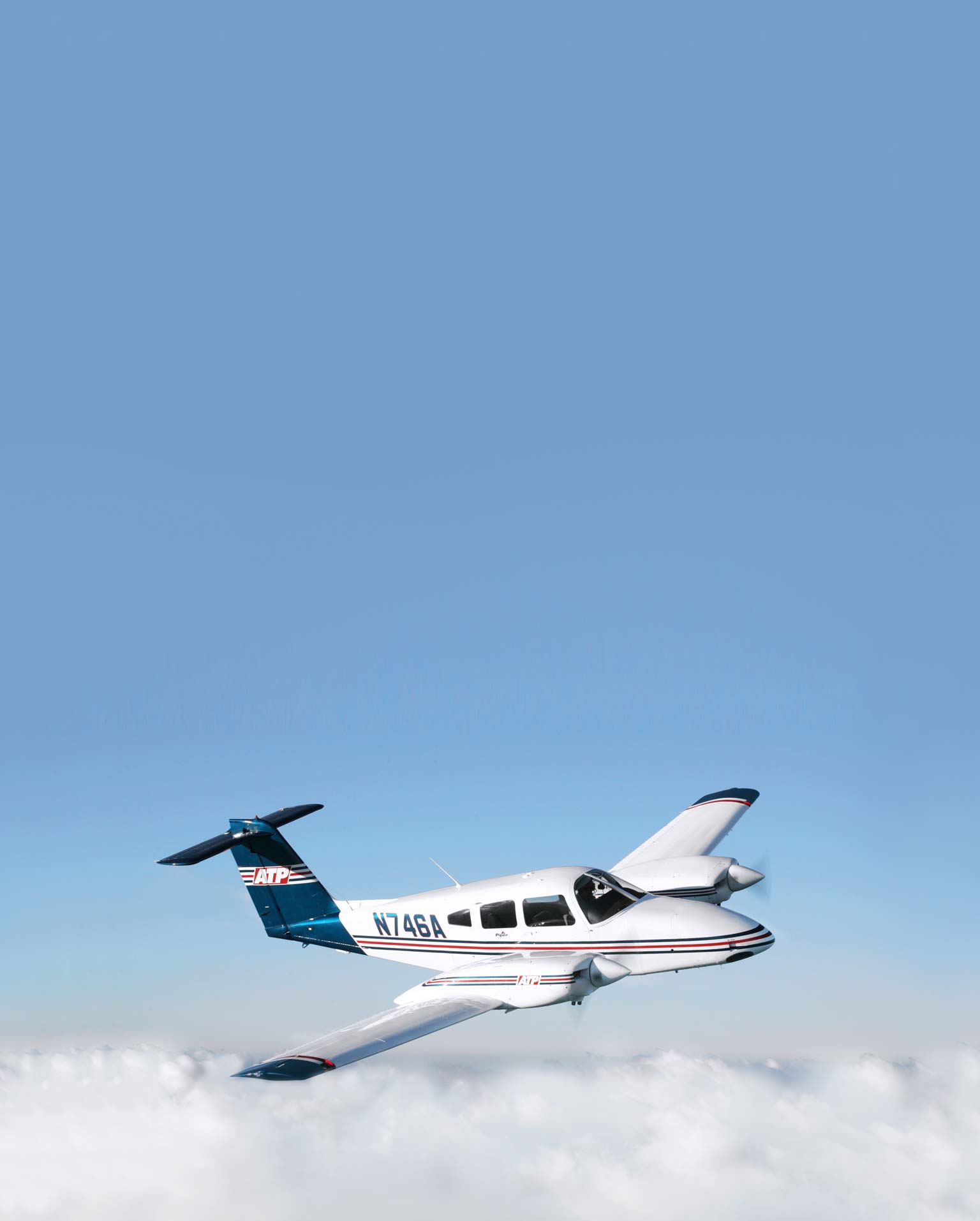 Piper Seminole multi-engine training aircraft in flight