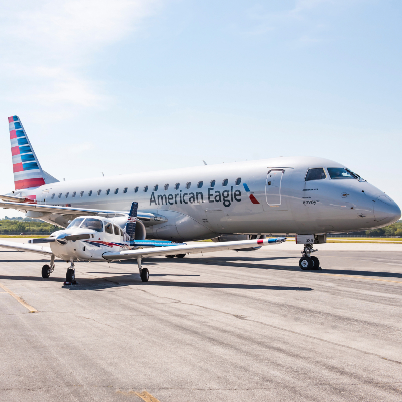 American Eagle and ATP Flight School aircraft parked on the tarmac