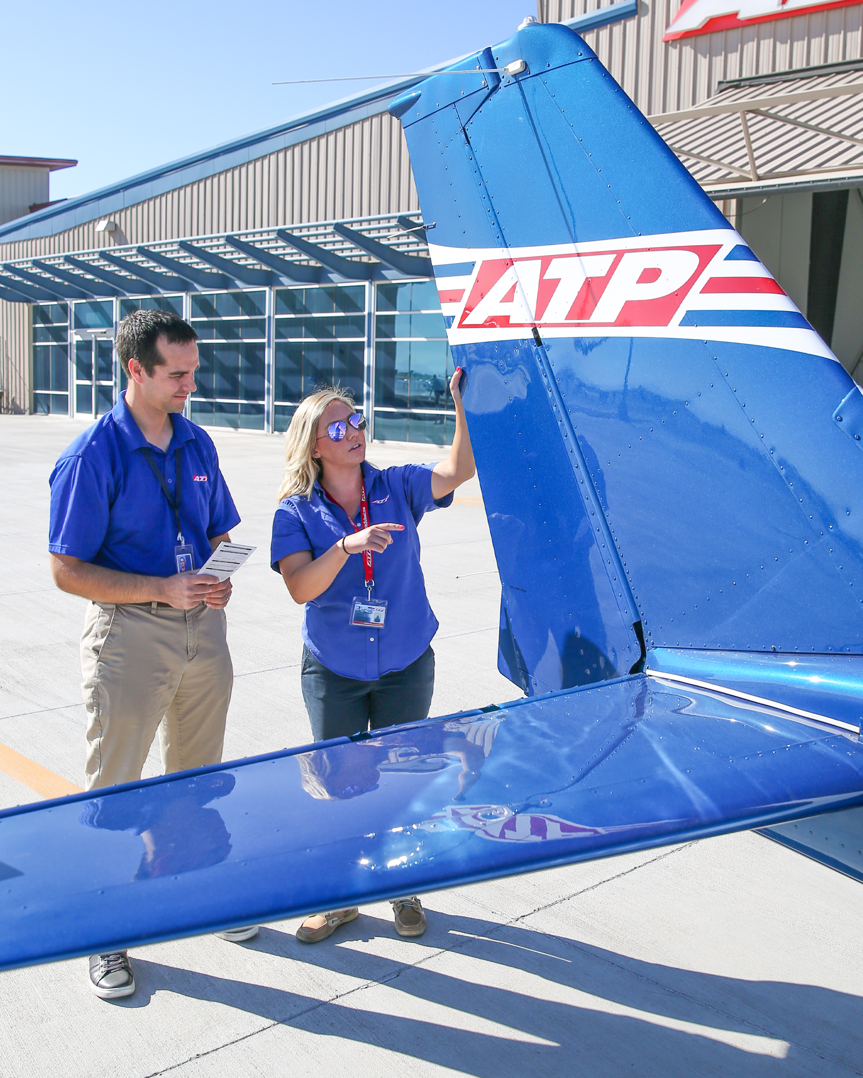 ATP students reviewing an aircraft during training